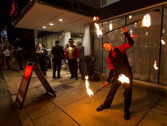 Elliot the Entertainer juggling fire